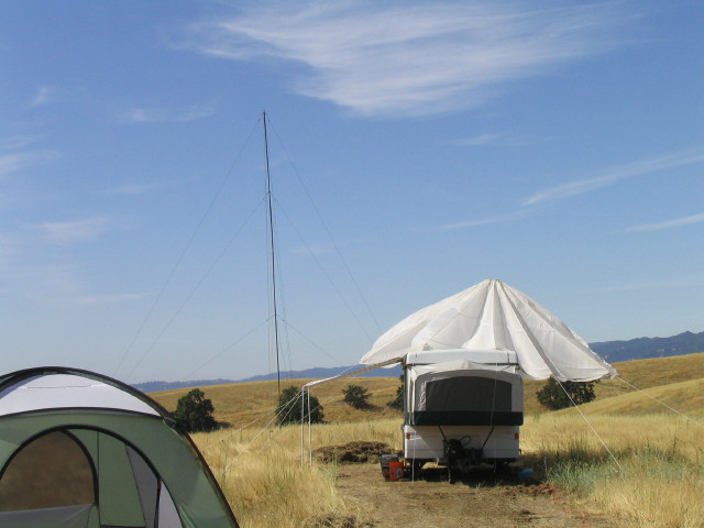 camper, tent, and antenna masts