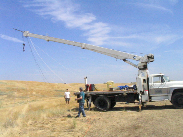 raising the boom on crane truck