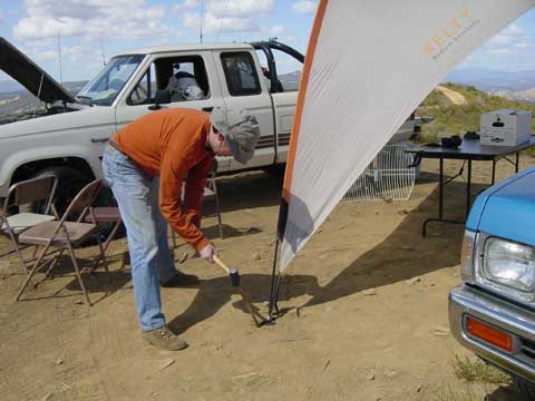 Kyle pounding a stake