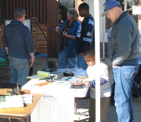 several visitors at the booth