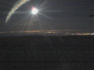 Full moon and city lights.