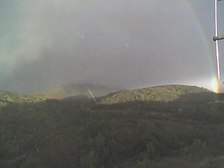 Rainbow at the start of a thunderstorm.